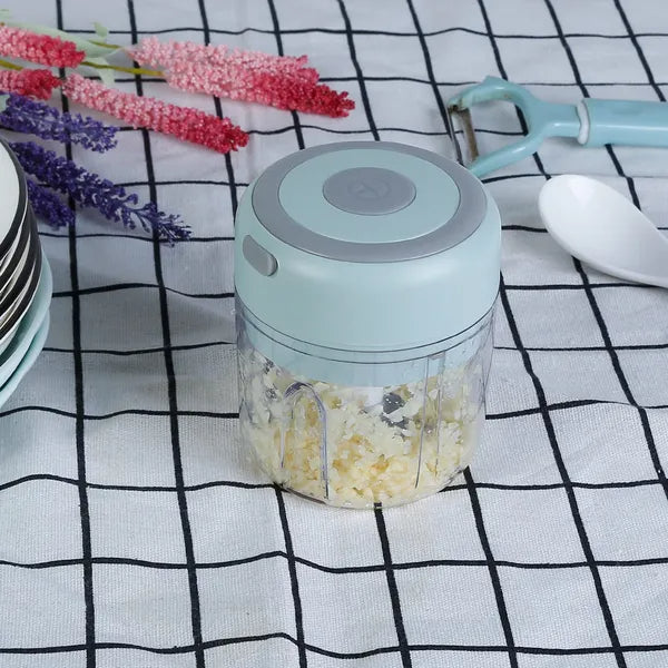 White mini electric garlic chopper with usb charging cable